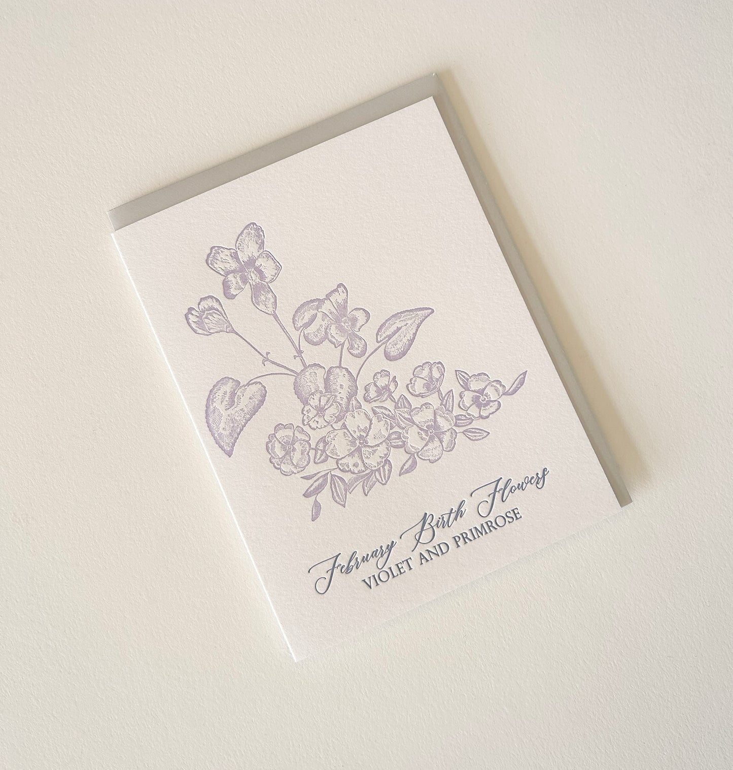 Letterpress birthday card with florals that says "February Birth Flowers, Violet and Primrose" by Rust Belt Love