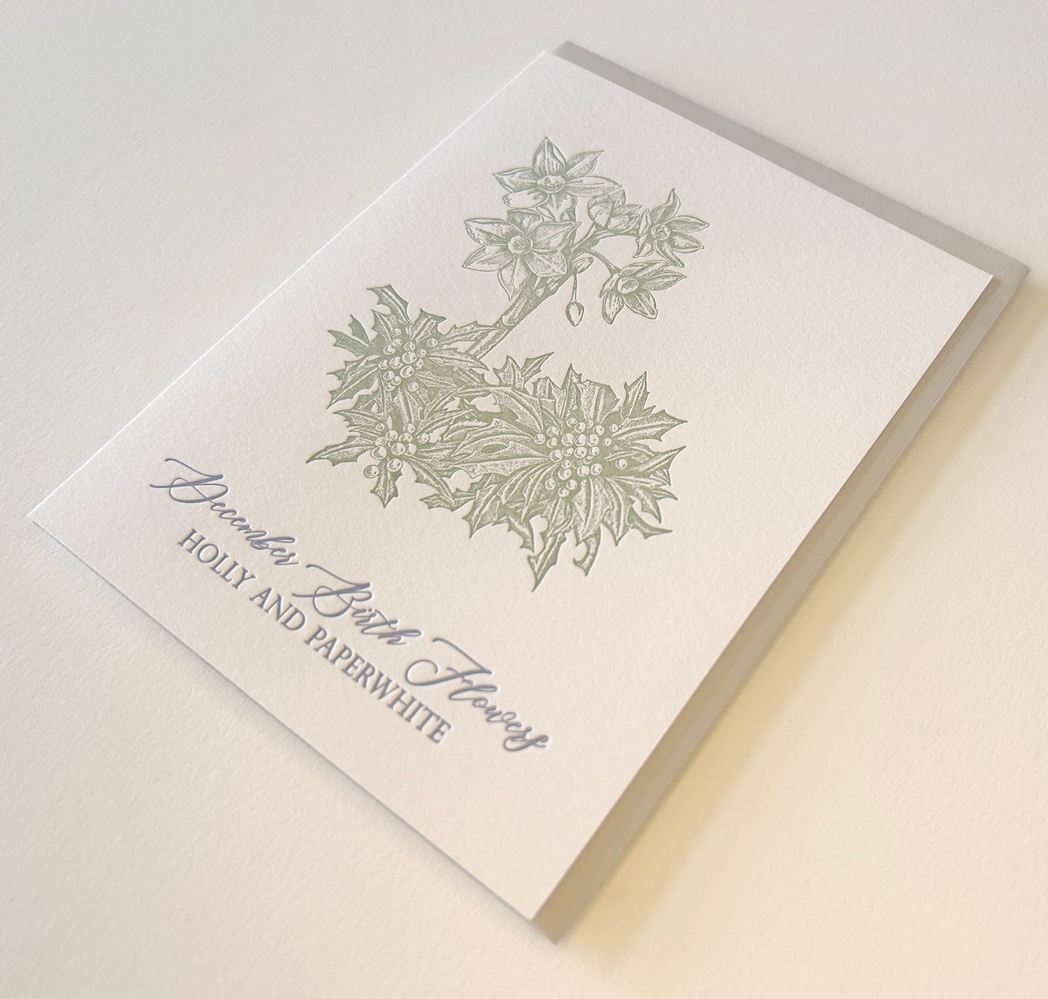 Letterpress birthday card with florals that says "December Birth Flowers, Holly And Paperwhite" by Rust Belt Love