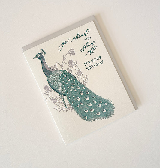 Letterpress birthday card with florals and a peacock that says " Go ahead and show off it's your birthday" by Rust Belt Love