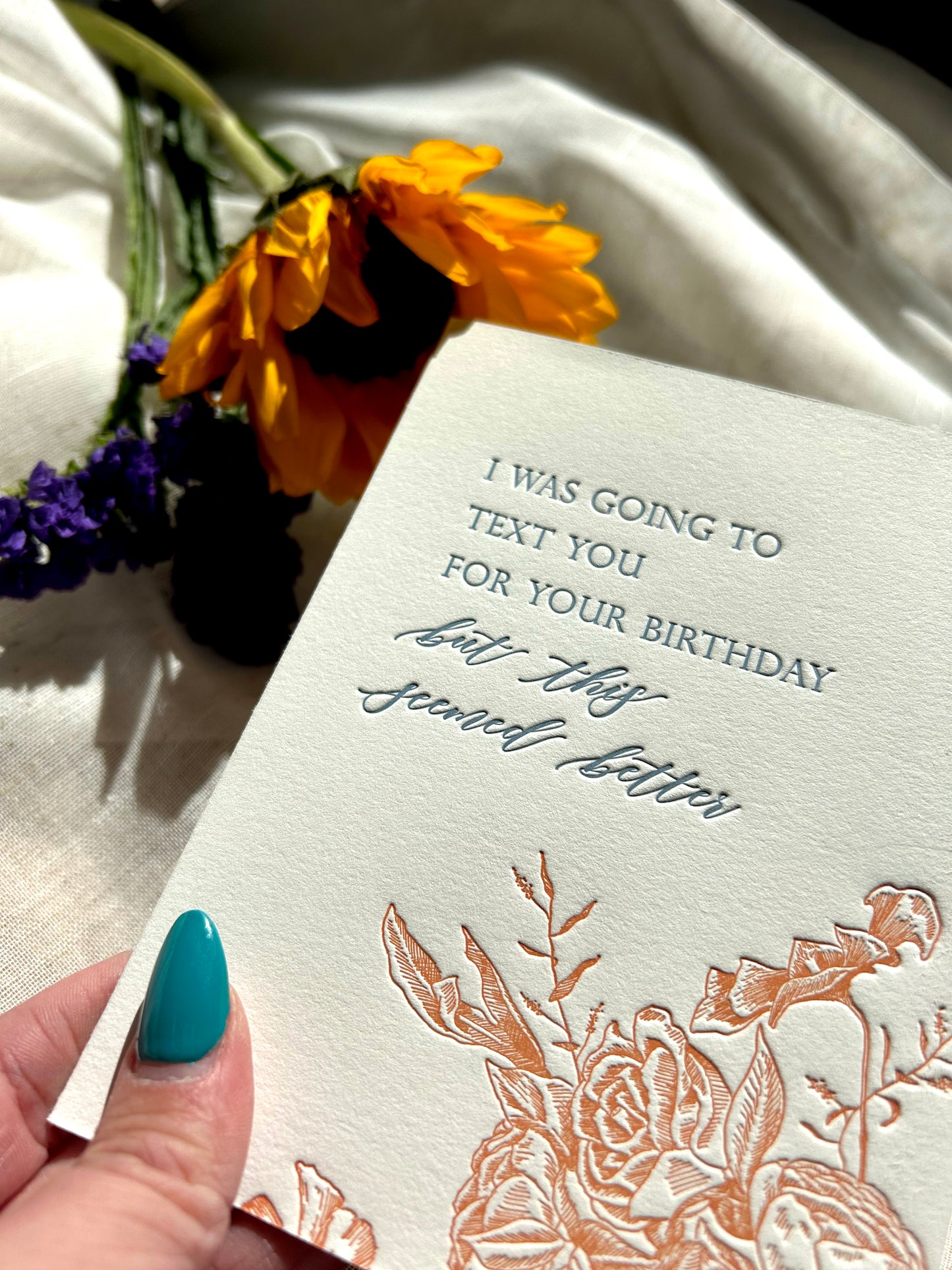 Letterpress birthday card with florals that says " I was going to text you for your birthday but this seemed better" by Rust Belt Love