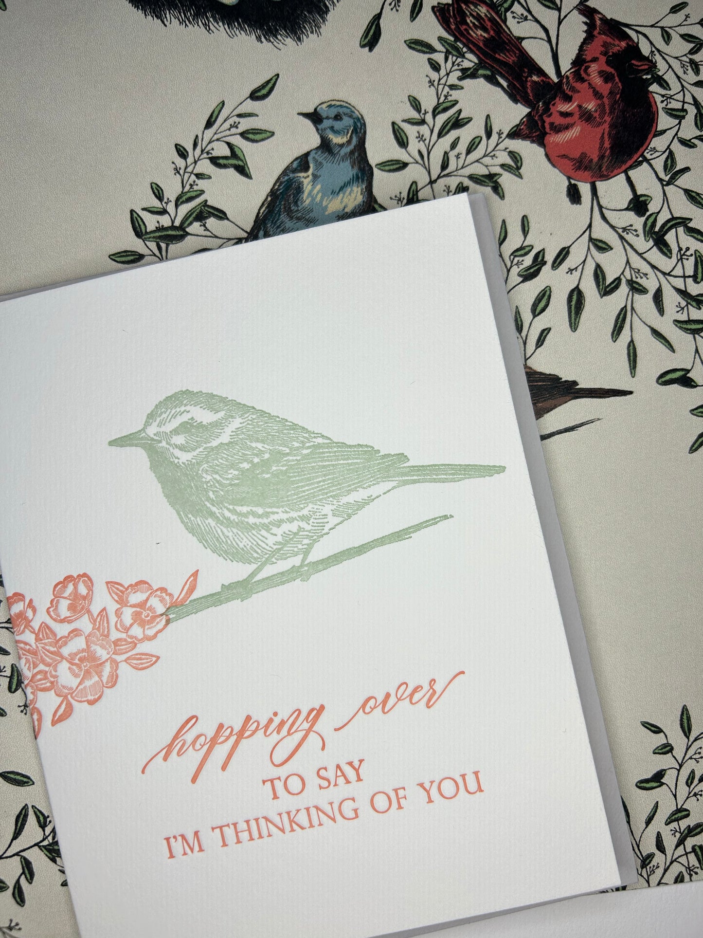 Letterpress friendship card with a bird that says "Hopping over to say I'm thinking of you" by Rust Belt Love