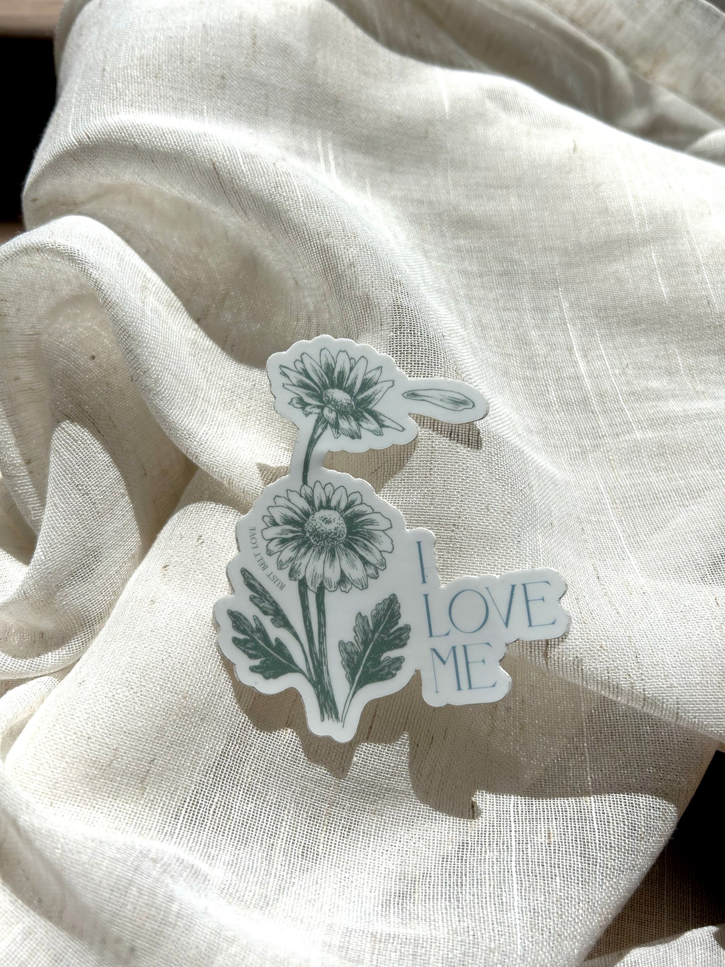 Green floral sticker that says "I love me" by Rust Belt Love