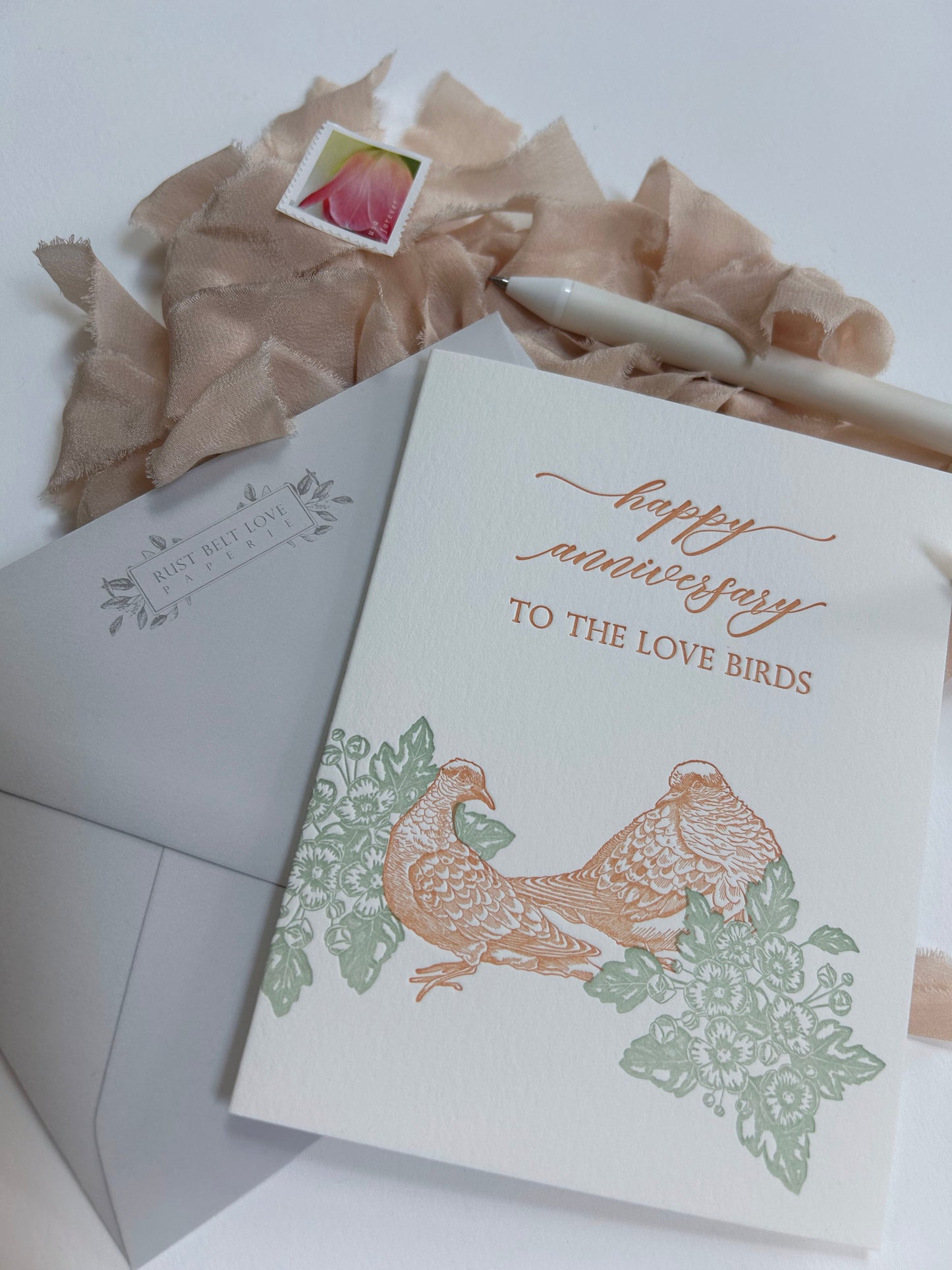 Letterpress love card with florals and birds that says "Happy anniversary to the love birds" by Rust Belt Love