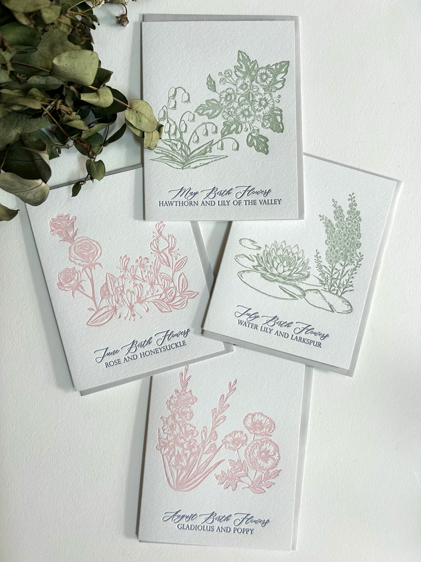 A variety of Rust Belt Love's floral birth month letterpress cards.