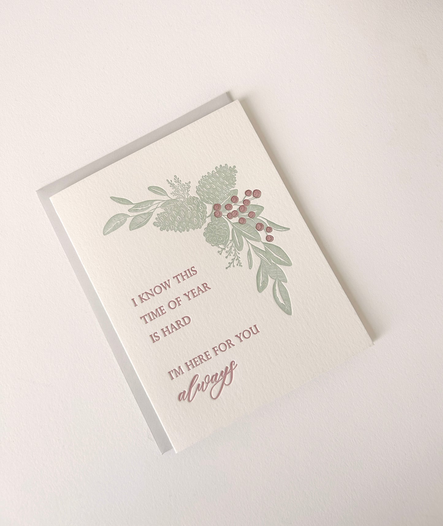 Letterpress holiday card with pinecones that says " I Know This Time Of Year Is Hard I'm Here For You Always" by Rust Belt Love