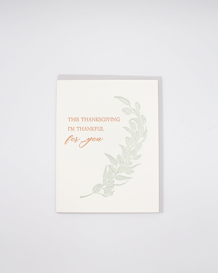 Letterpress holiday card with greenery that reads "This thanksgiving i'm thankful for you" by Rust Belt Love