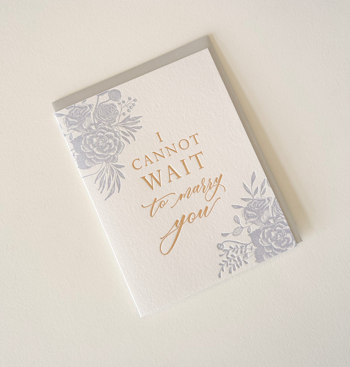 Letterpress wedding card with florals that says "I cannot wait to marry you" by Rust Belt Love