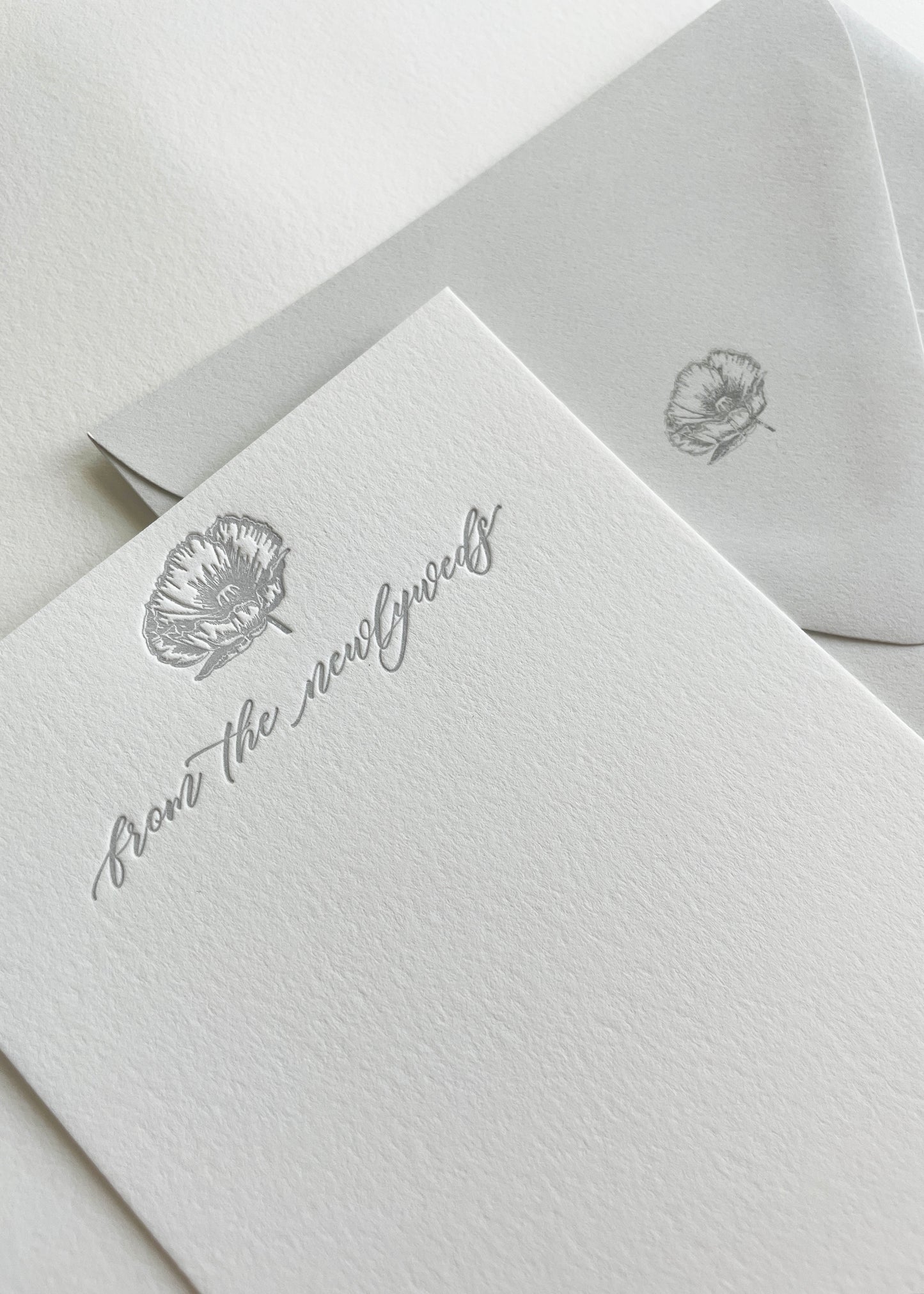 Letterpress flatnote cards with grey cosmo that says "From The Newlyweds" by Rust Belt Love