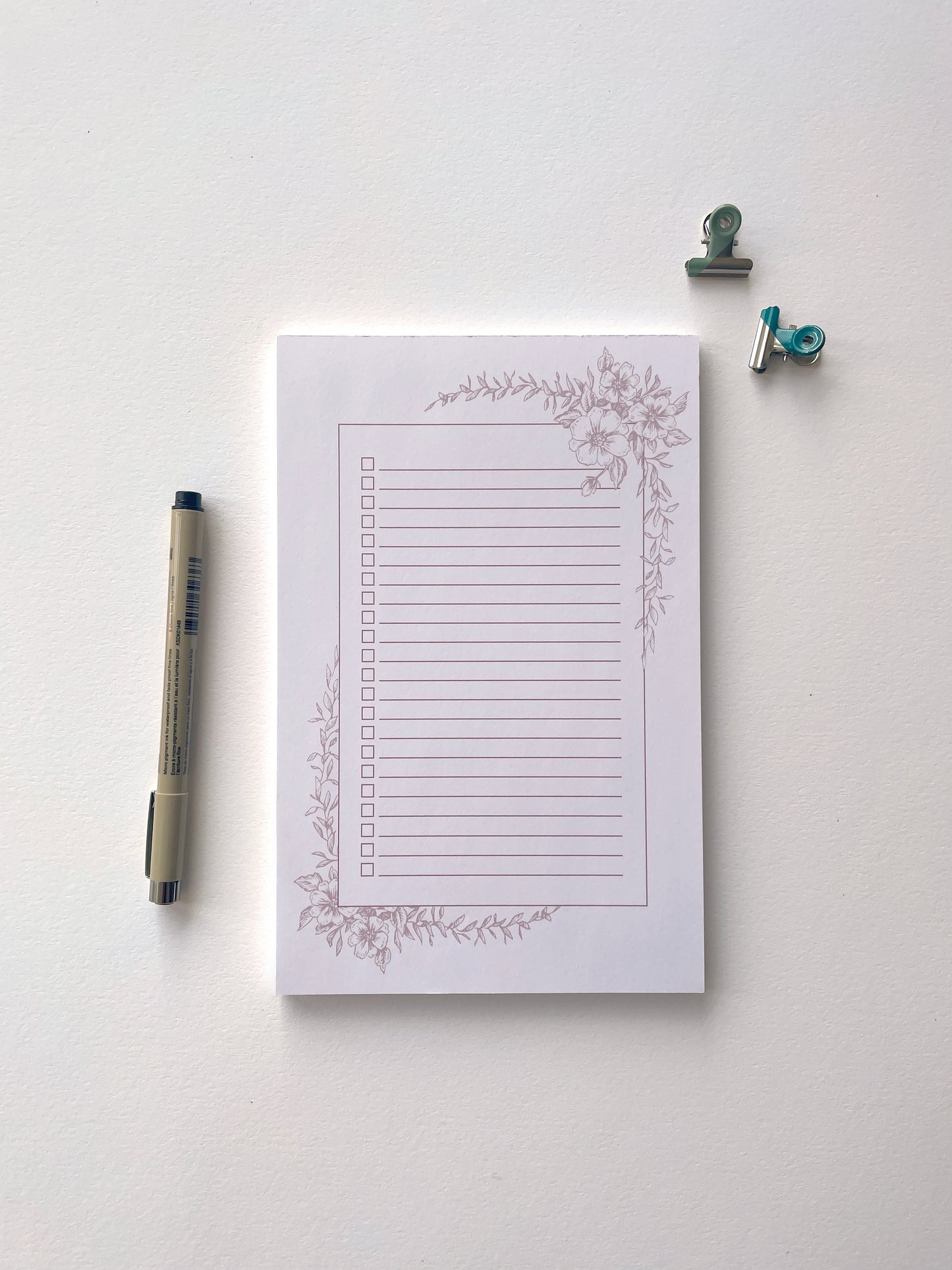 5.5 by 8.5 notepad with lined sheets with dusty rose florals by Rust Belt Love