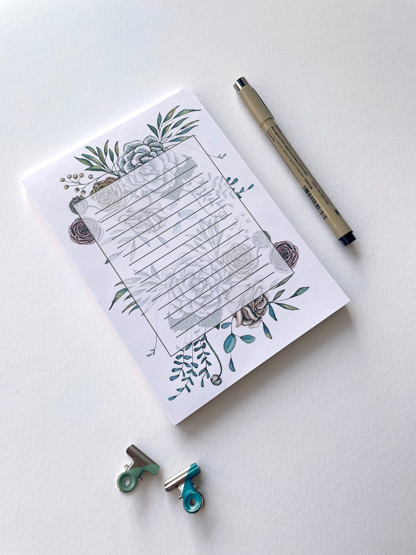 5 by 7 notepad with lined sheets with multi-colored florals by Rust Belt Love