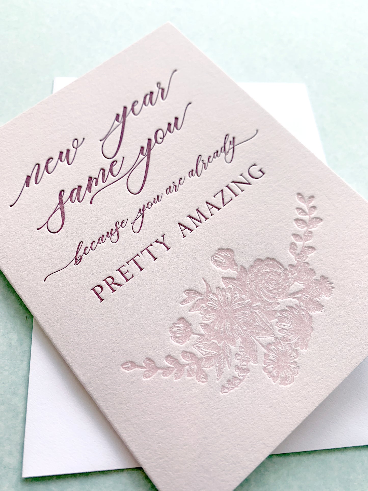 Letterpress holiday card with florals that says "New year same you because you are already pretty amazing" by Rust Belt Love