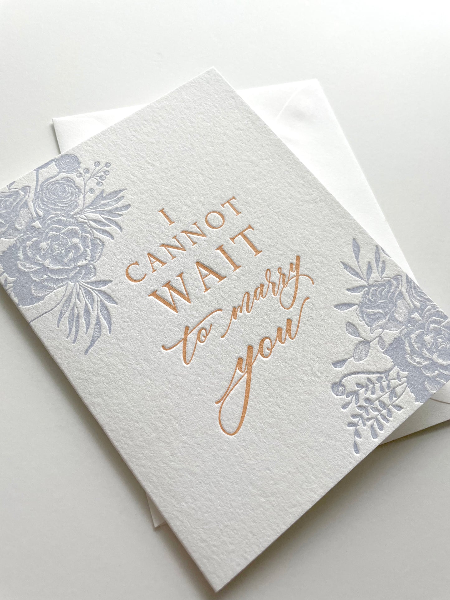 Letterpress wedding card with florals that says "I cannot wait to marry you" by Rust Belt Love