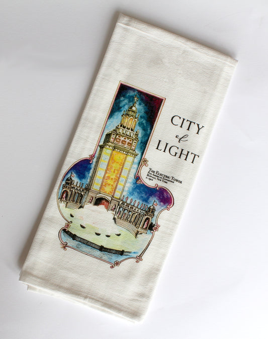 White Tea Towel with electric tower illustration that says "City of Light" by Rust Belt Love