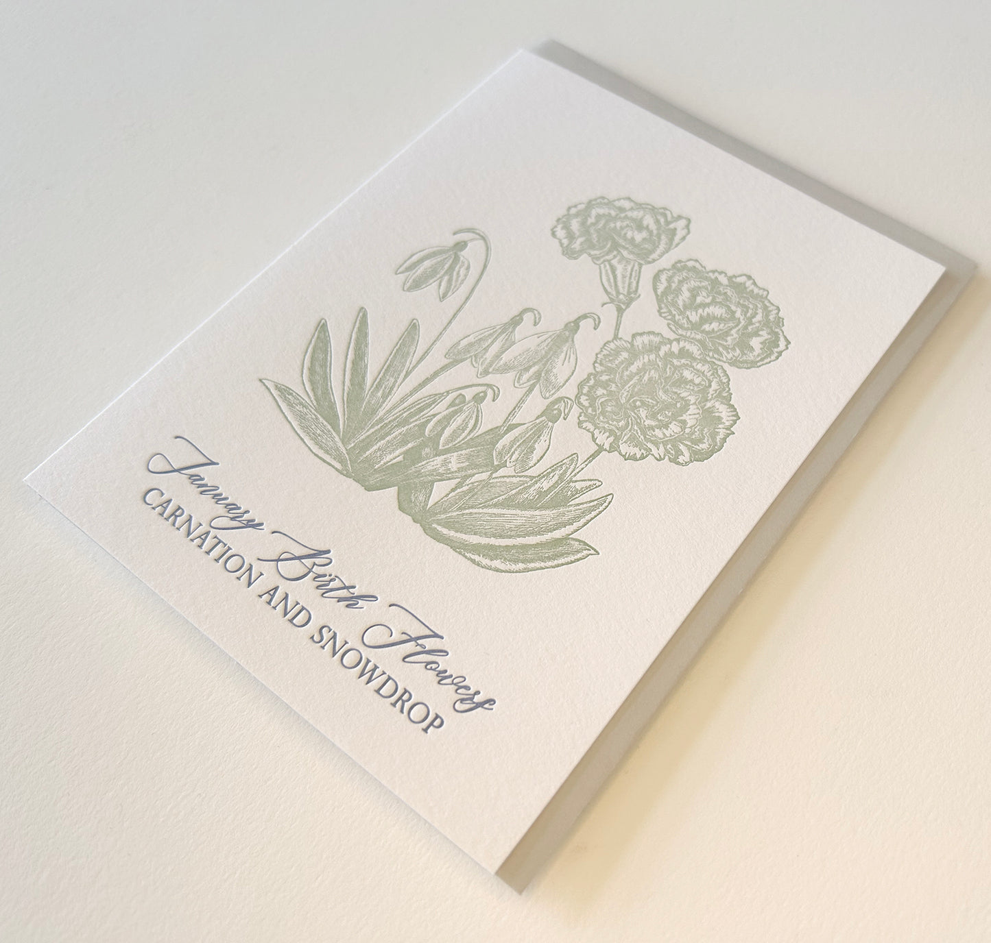 Letterpress birthday card with florals that says "January birth flowers carnation and snowdrop" by Rust Belt Love