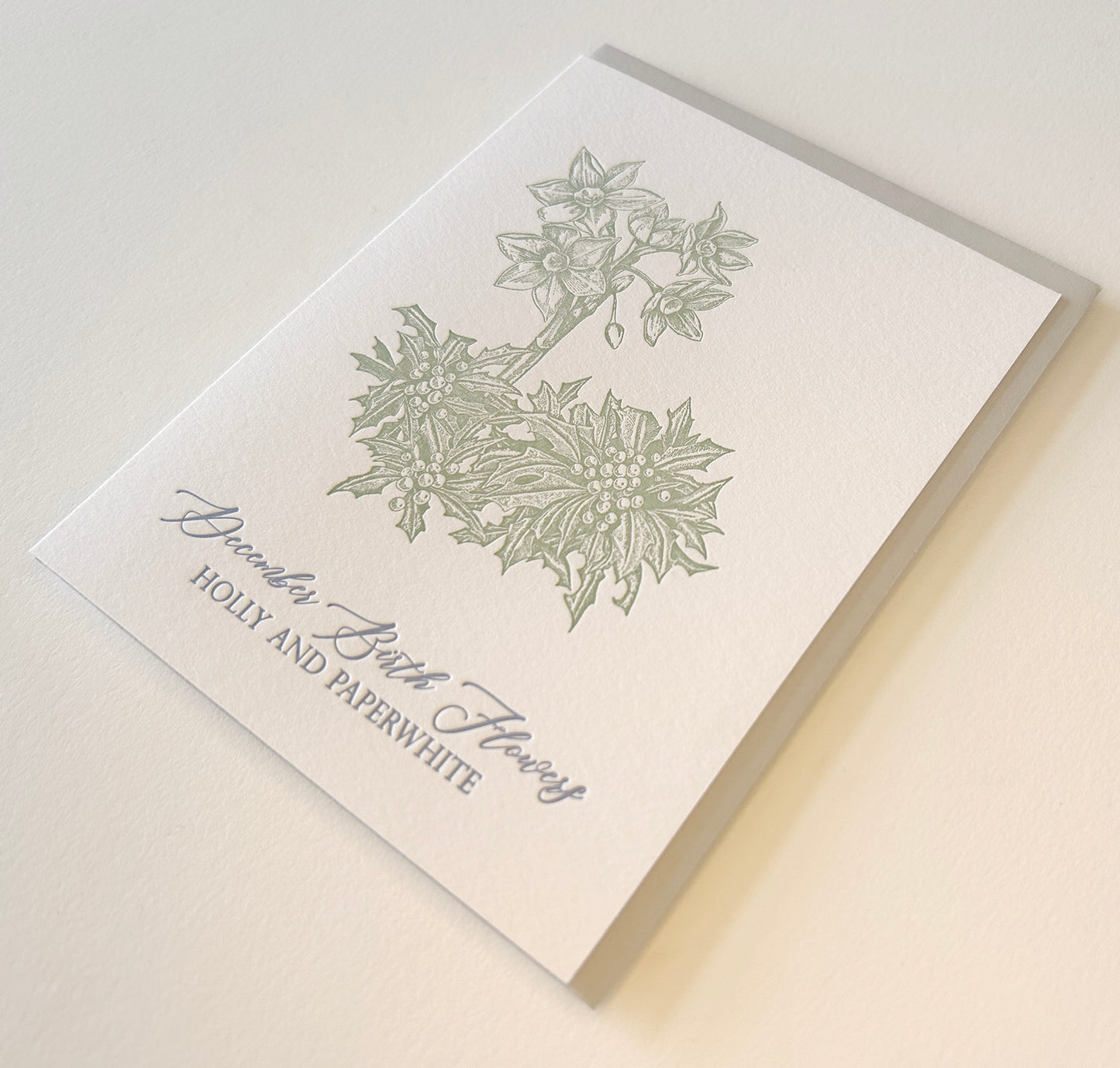 Letterpress birthday card with florals that says "December Birth Flowers, Holly And Paperwhite" by Rust Belt Love