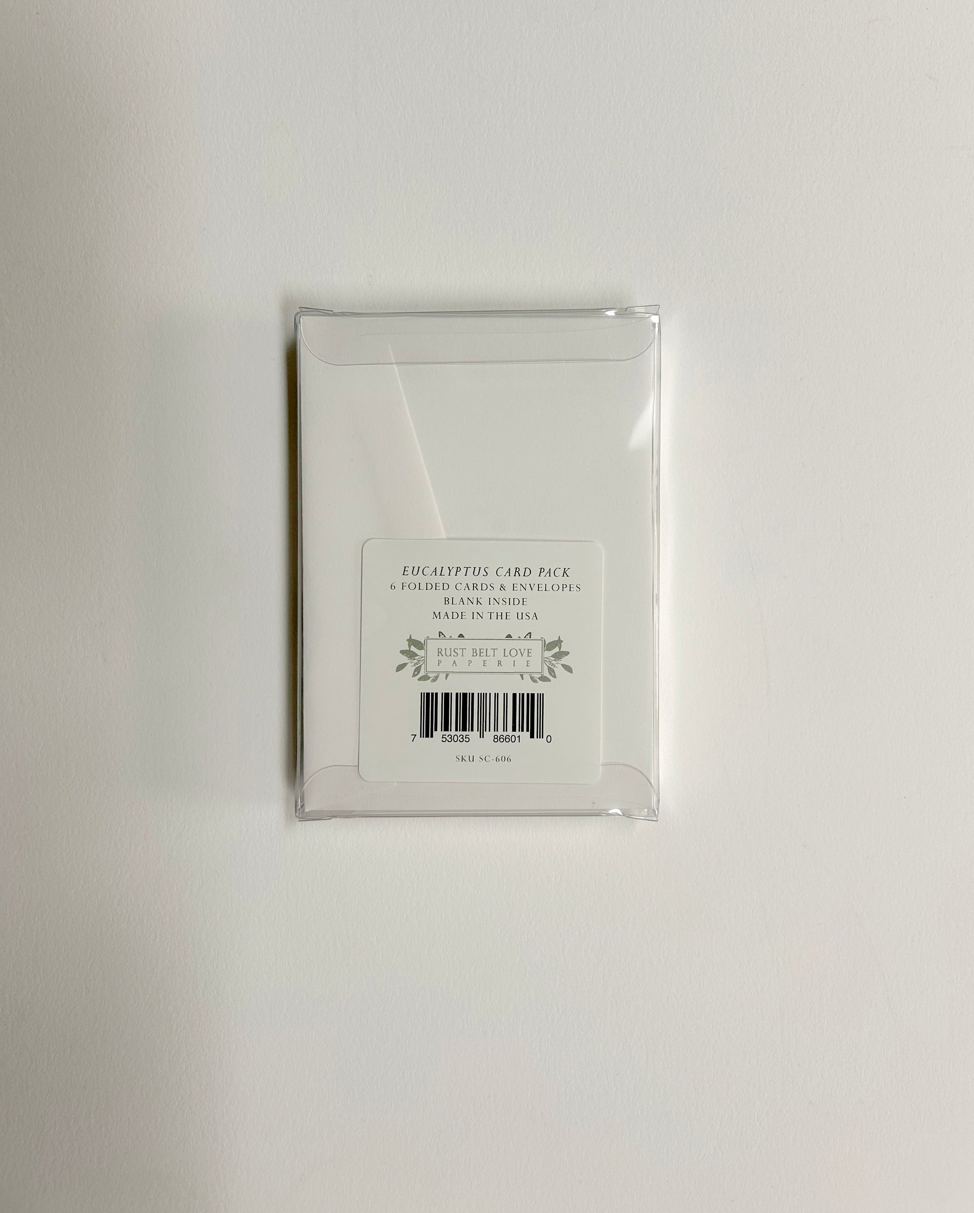 Back of clear plastic box that the small cards come in 