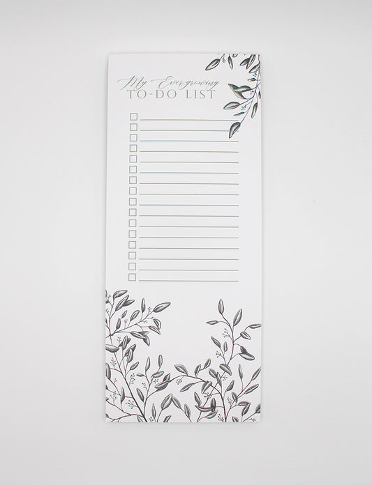 3.5 by 8.5 notepad with lined sheets with florals that says "My ever-growing to-do list" by Rust Belt Love