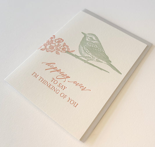 Letterpress friendship card with a bird that says "Hopping over to say I'm thinking of you" by Rust Belt Love