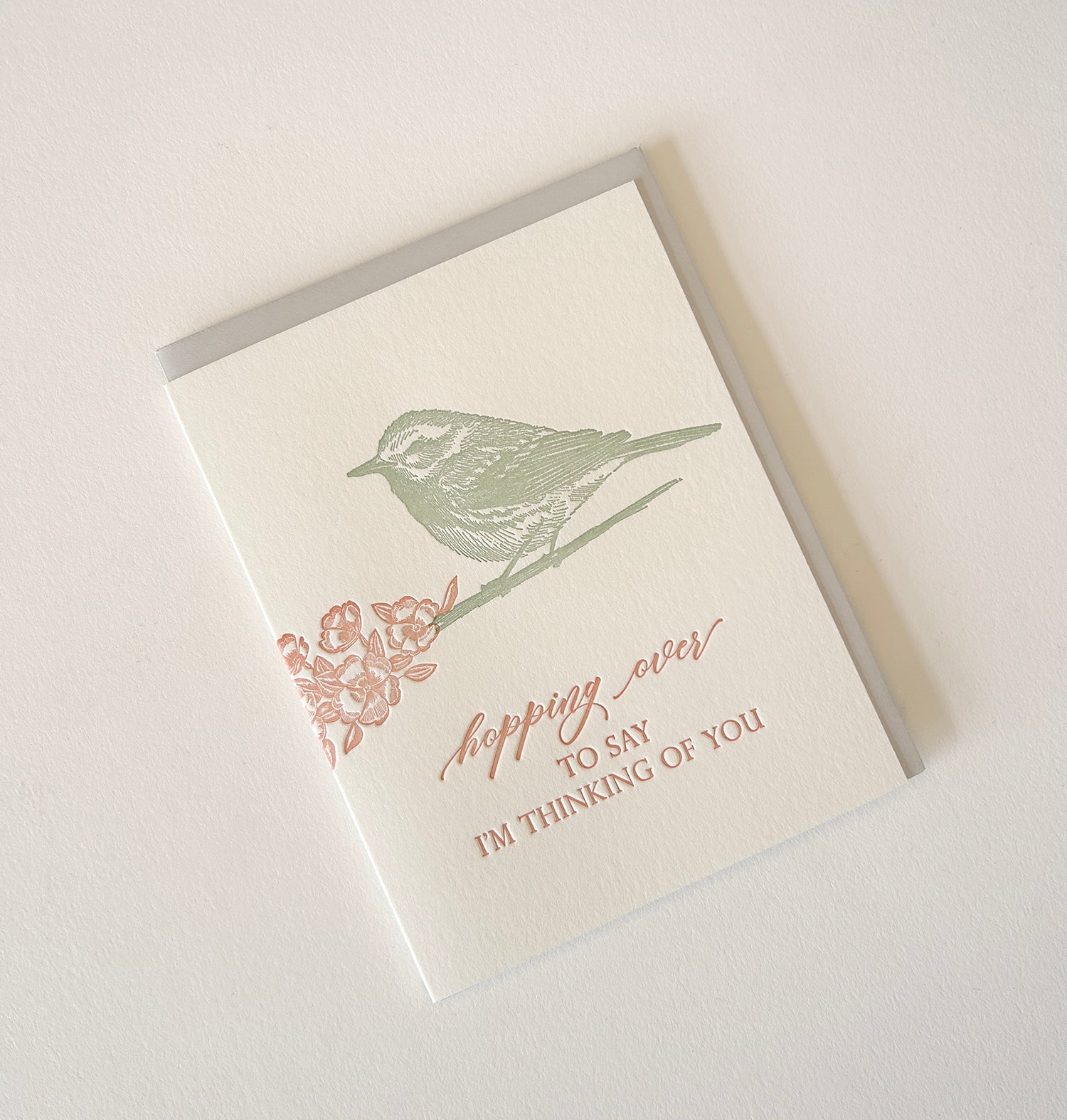 Letterpress friendship card with a bird that says "Hopping over to say I'm thinking of you" by Rust Belt Love