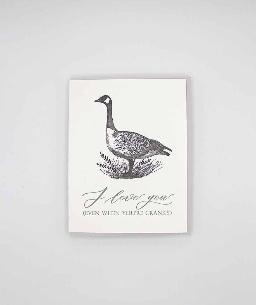 Letterpress love greeting card with a goose illustration on it that reads "I love you (even when you're cranky)" by Rust Belt Love