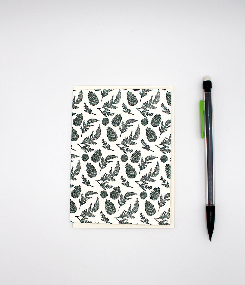 Letterpress green pinecone small card by Rust Belt Love, shown with pencil for size reference