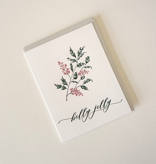 Letterpress holiday card with holly that says "holly jolly" by Rust Belt Love