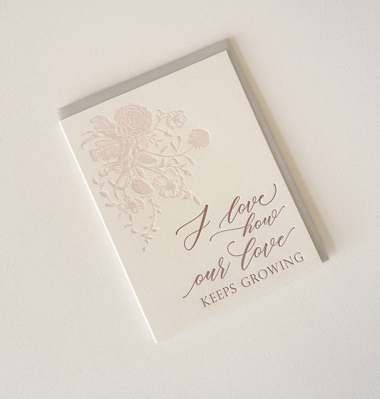 Letterpress love card with florals that says "I love how our love keeps growing" by Rust Belt Love