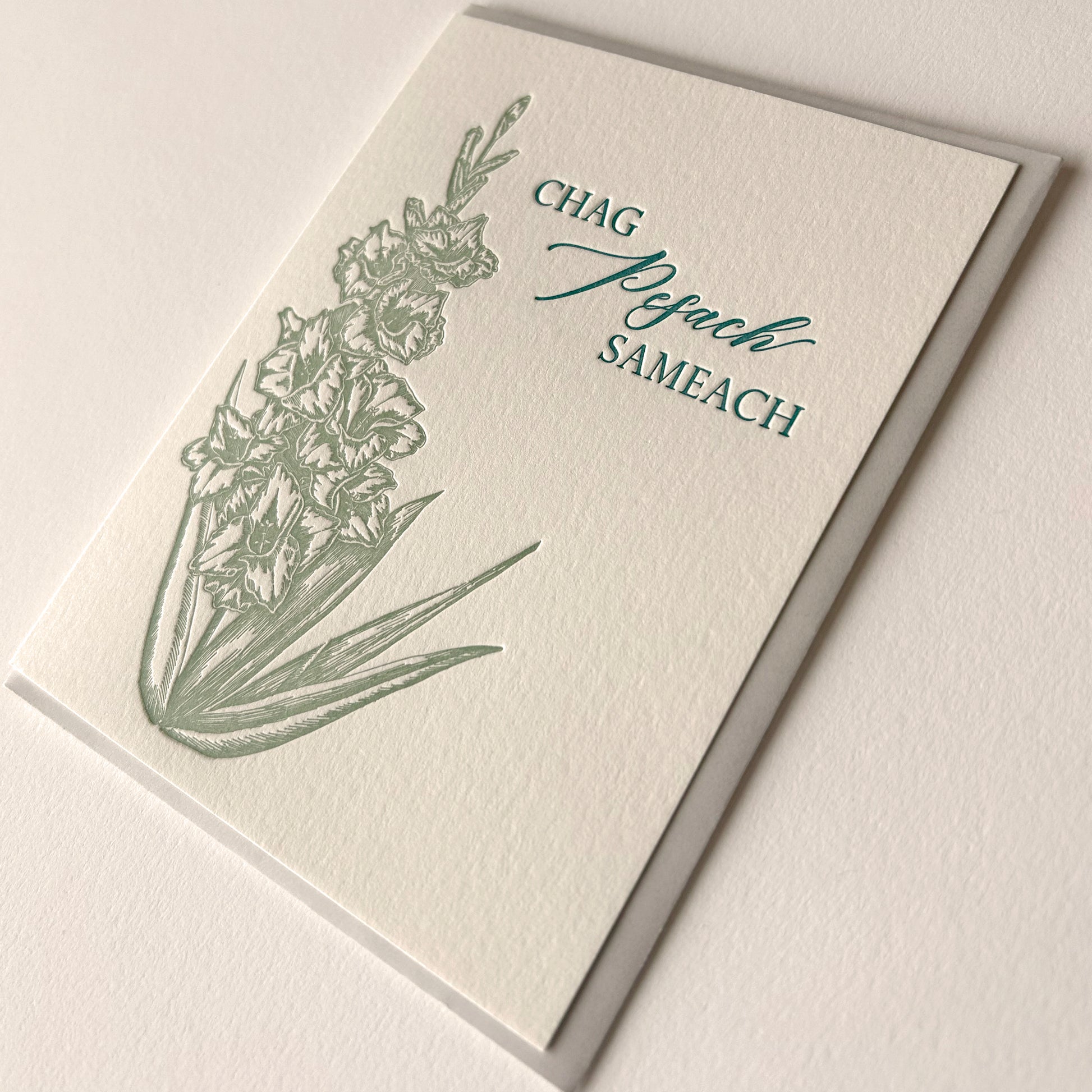 Letterpress Passover card with florals that says " Chag Pesach Sameach" by Rust Belt Love 