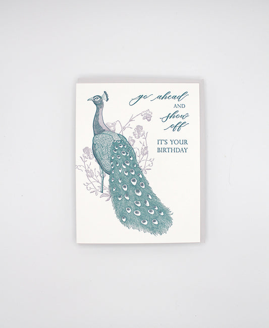 Letterpress birthday card with florals and peacock illustration that reads "Go ahead and show off it's your birthday" by Rust Belt Love