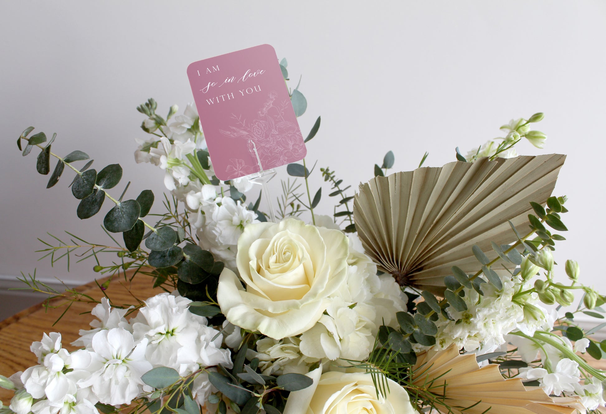 Rust Belt Love's pink floral minicard that reads "I am so in love with you"