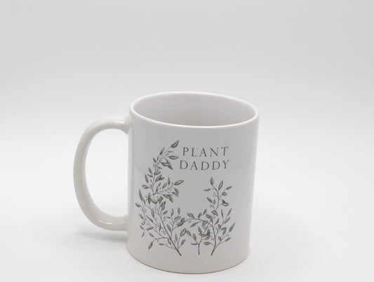 White ceramic mug with greenery that says "Plant daddy" by Rust Belt Love