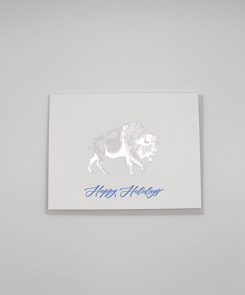 Silver foil buffalo holiday card that reads "happy holidays" by Rust Belt Love