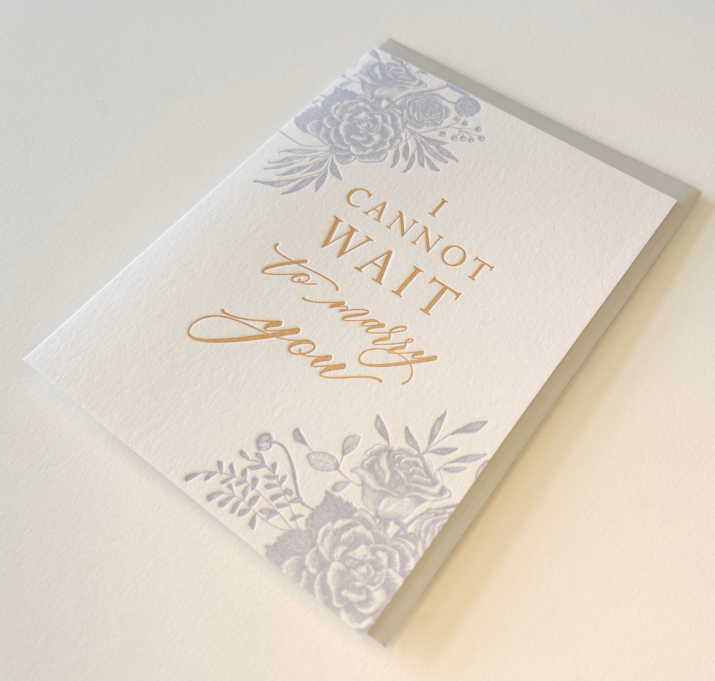 Letterpress wedding card with florals that says "I cannot wait to marry you" by Rust Belt Love