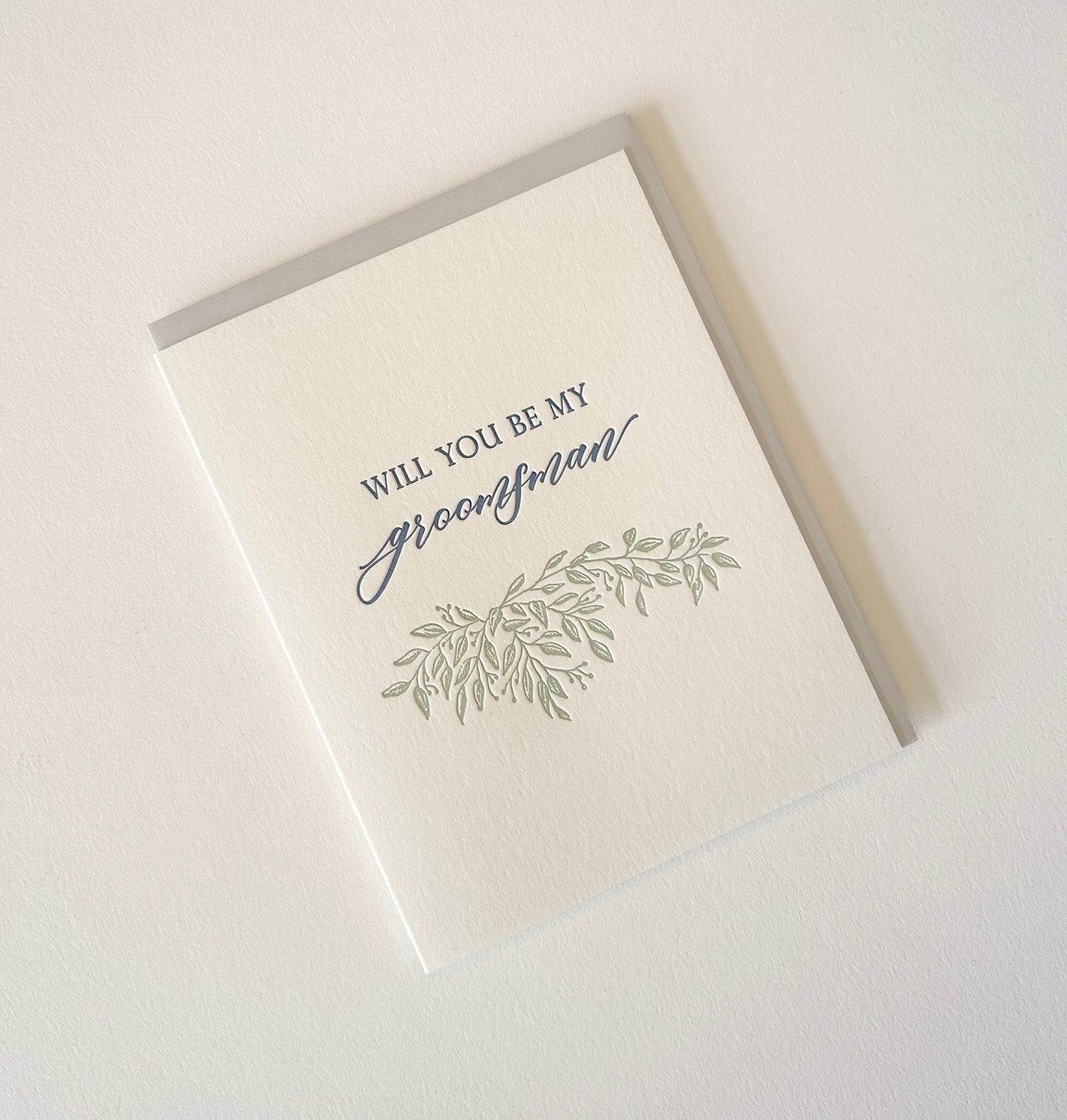 Letterpress wedding card with florals that says " Will You Be My Groomsman" by Rust Belt Love