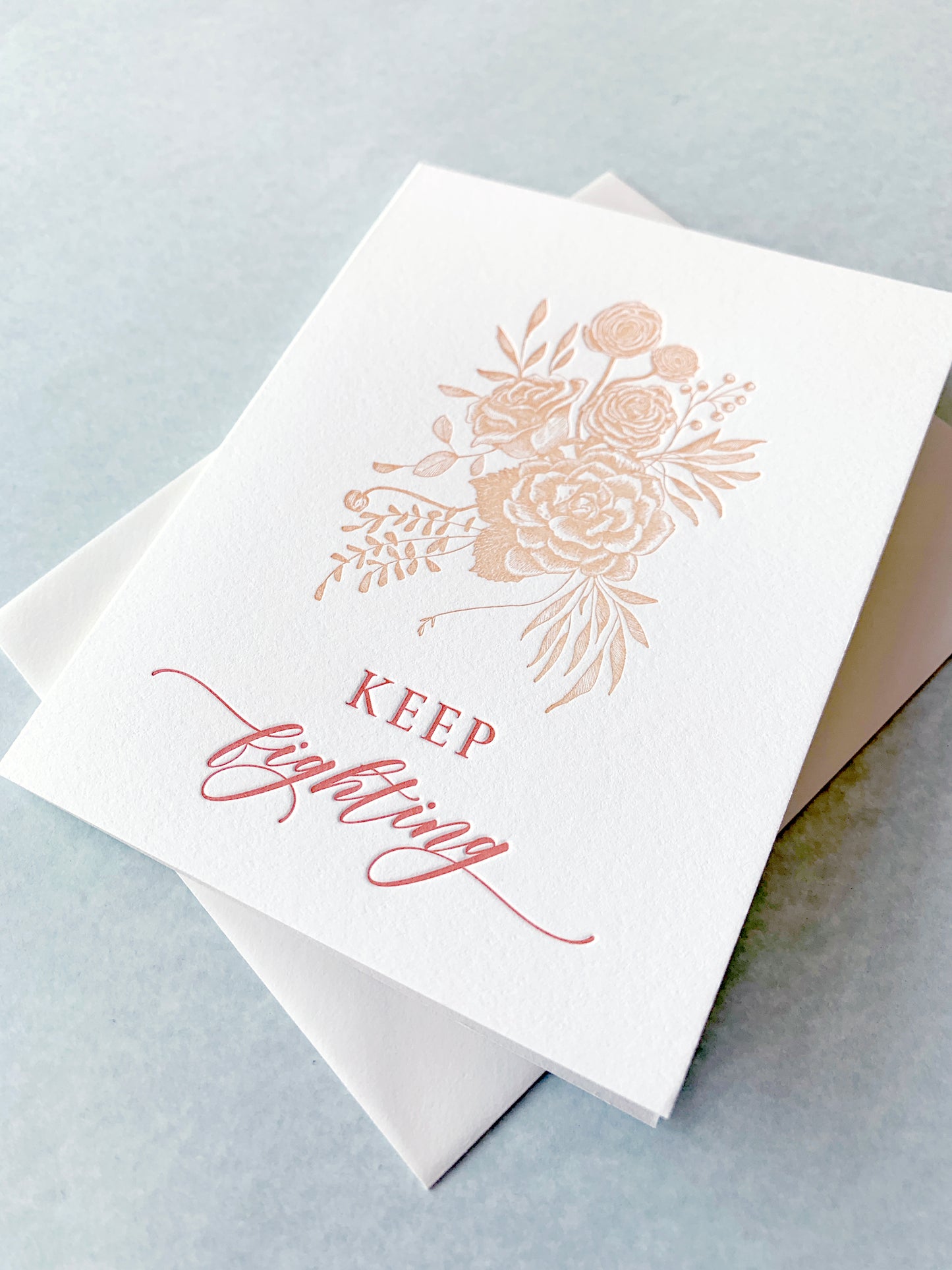 Letterpress friendship card with florals that says "Keep fighting" by Rust Belt Love