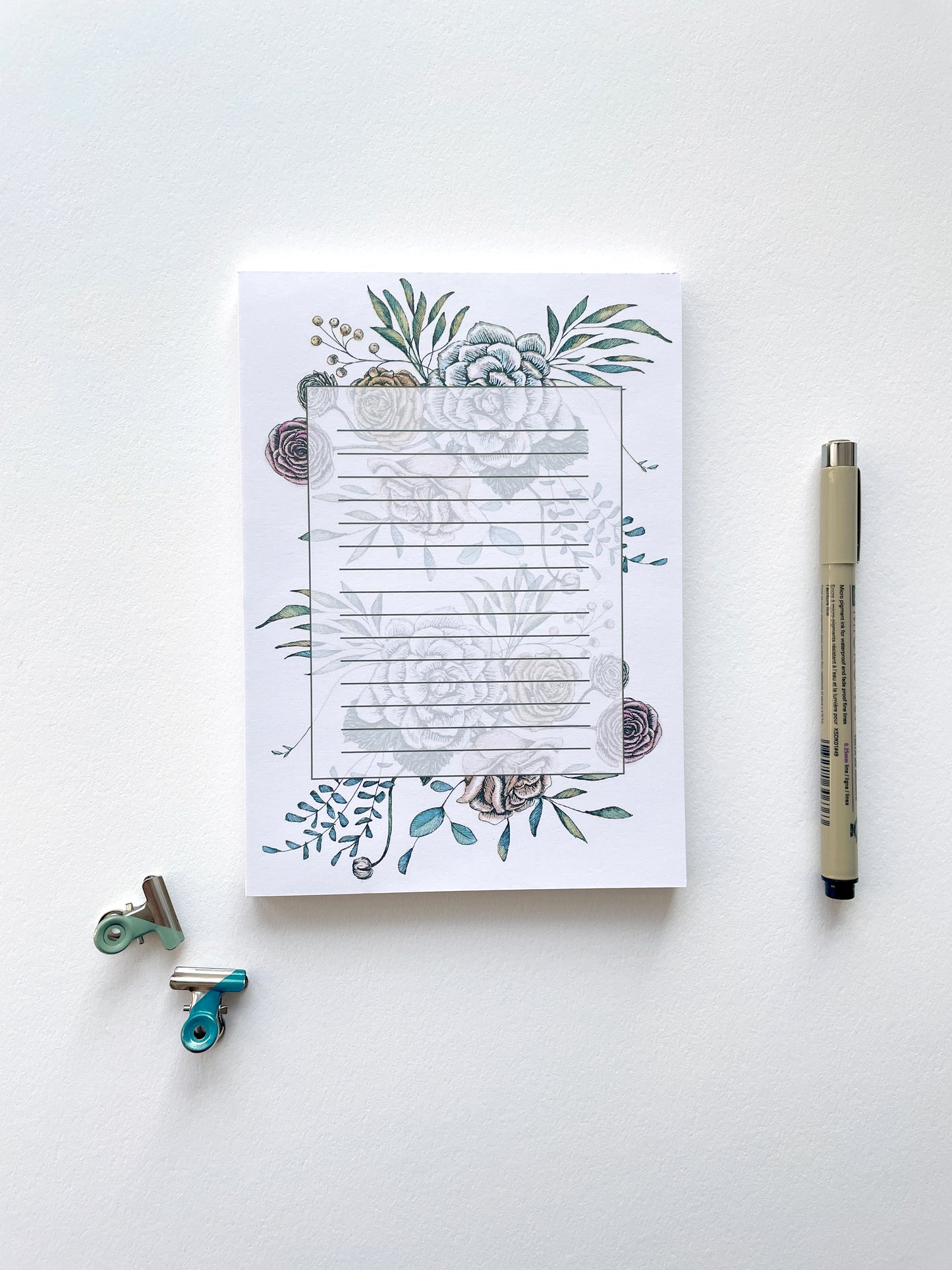 5 by 7 notepad with lined sheets with multi-colored florals by Rust Belt Love