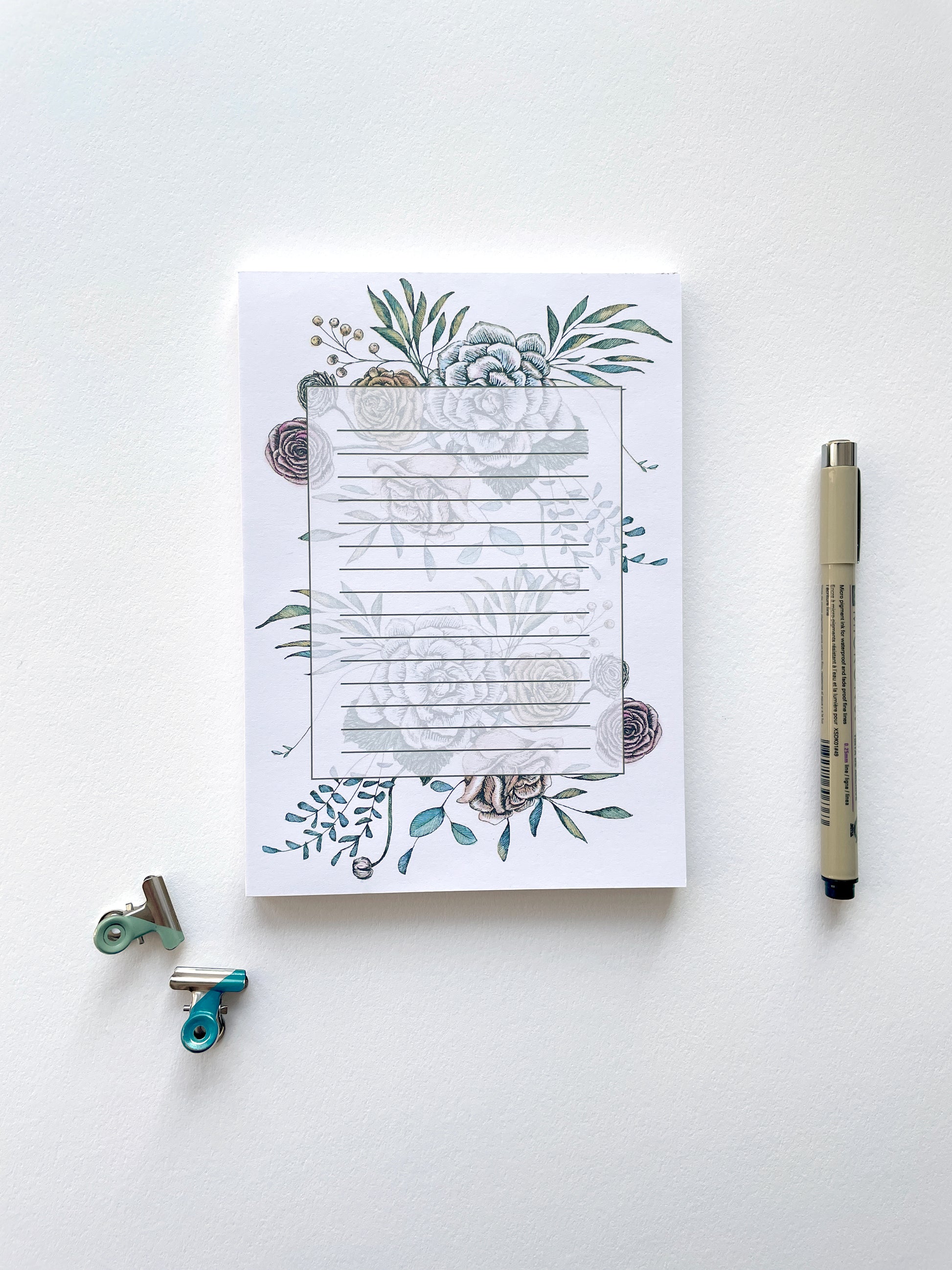 5 by 7 notepad with lined sheets with multi-colored florals by Rust Belt Love