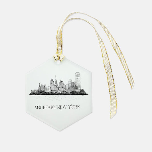 Frosted glass ornament with the buffalo skyline on it that says "Buffalo, New York" with a gold ribbon by Rust Belt Love