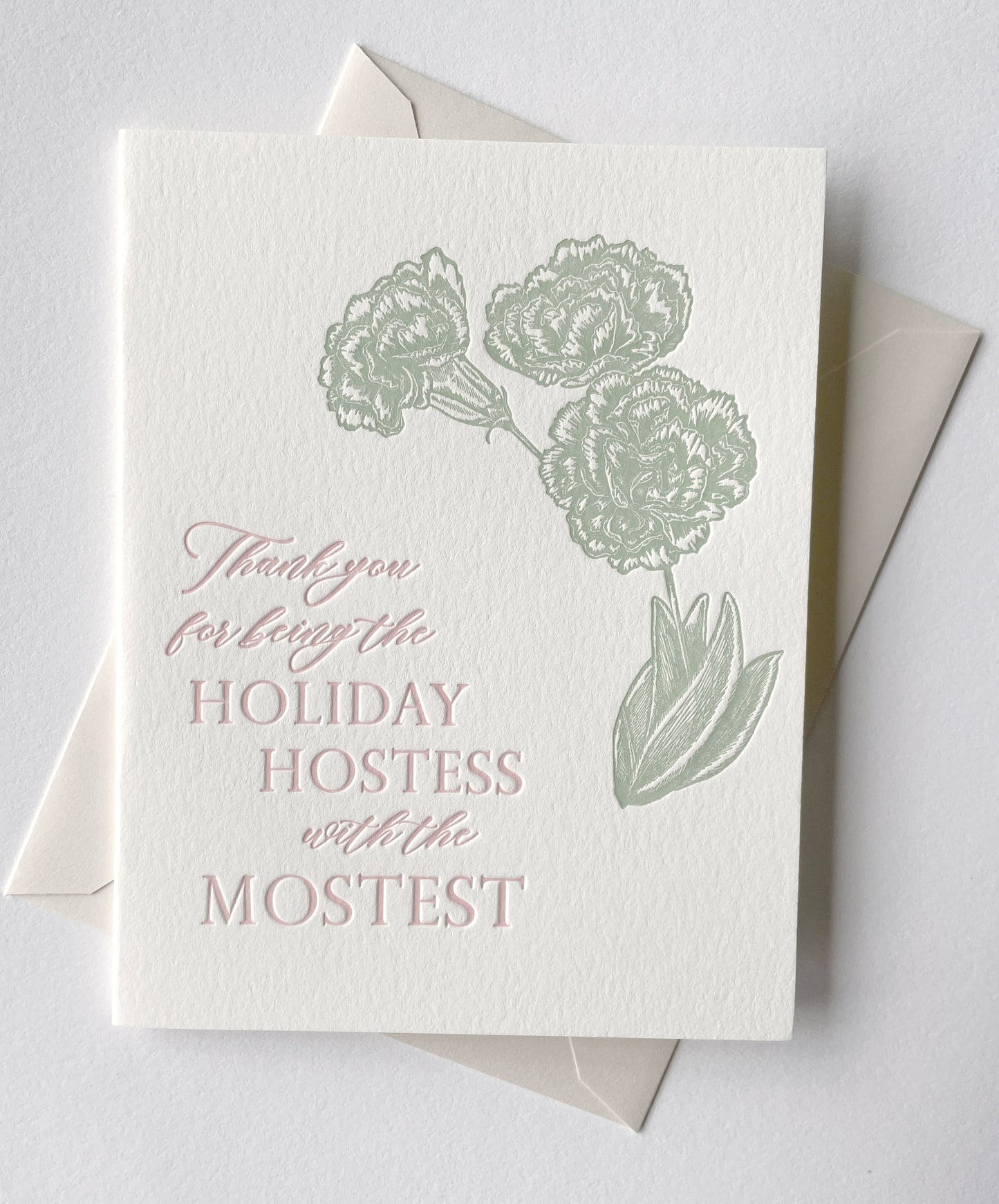 Letterpress holiday card with florals that says "Thank you for being the holiday hostess with the mostest" by Rust Belt Love