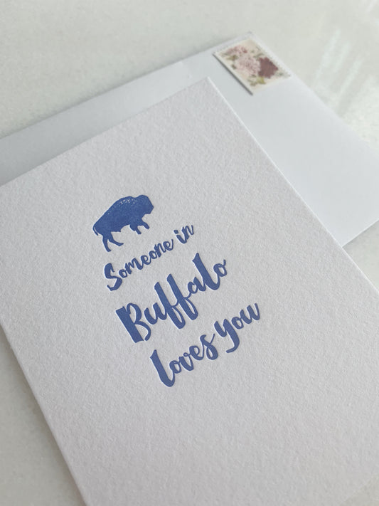 Letterpress  card with tiny blue buffalo that says "Someone in Buffalo loves you" by Rust Belt Love