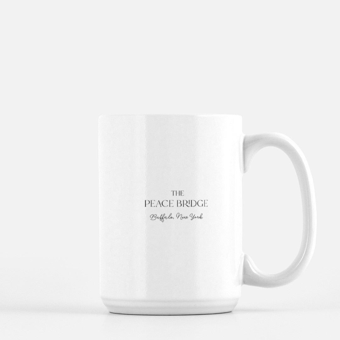 Back of white ceramic mug that says " The Peace Bridge Buffalo, New York" by Rust Belt Love