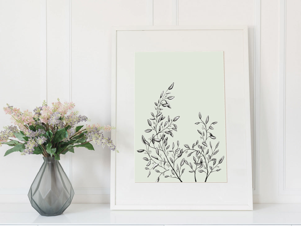 Framed print of a greenery illustration in a sage green color by Rust Belt Love