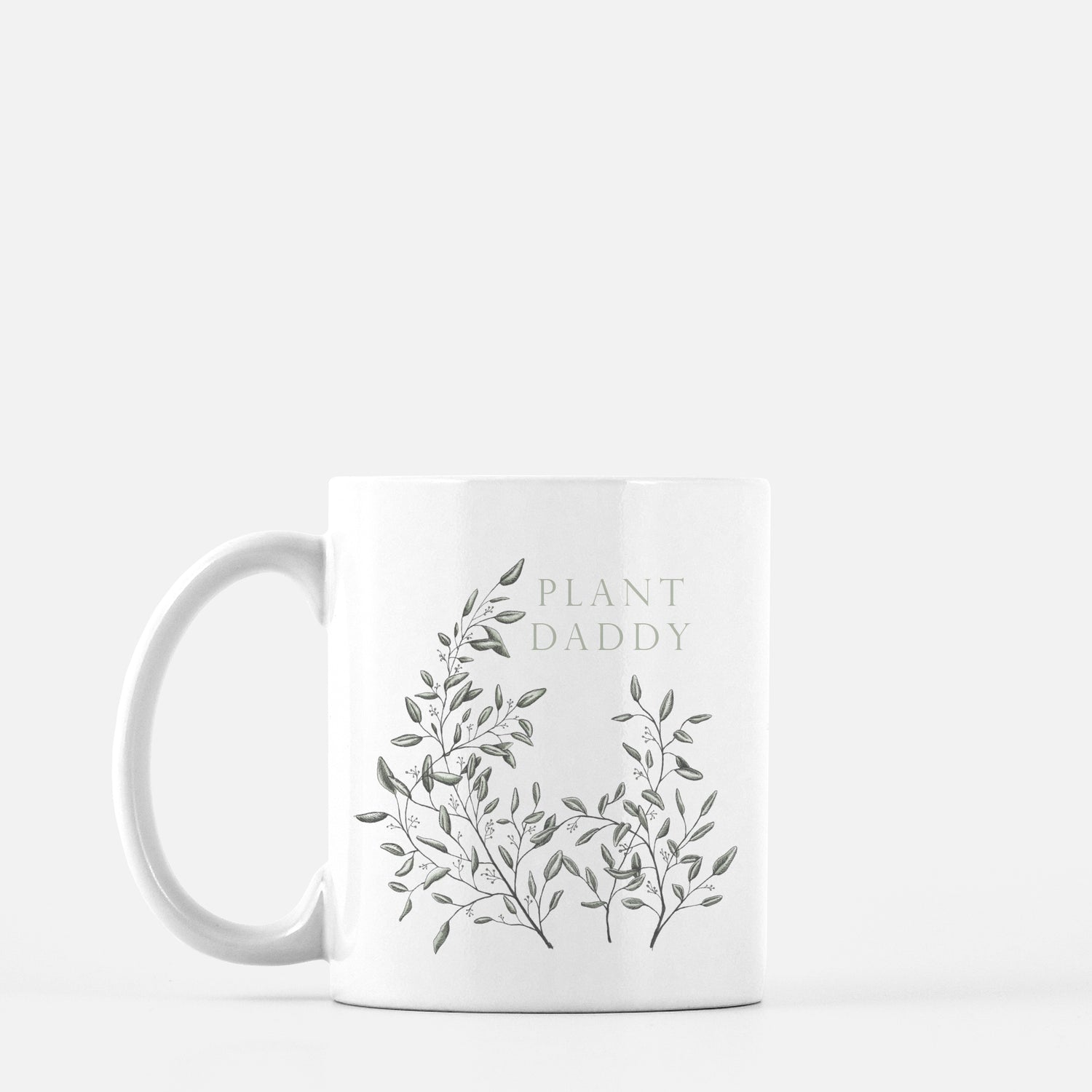 White ceramic mug with greenery that says "Plant daddy" by Rust Belt Love