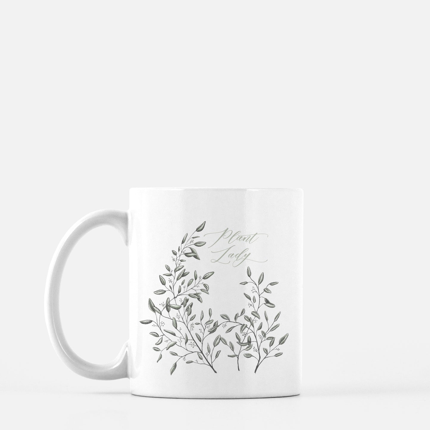 White ceramic mug with drawing of leafy greenery and words "Plant Lady" by Rust Belt Love