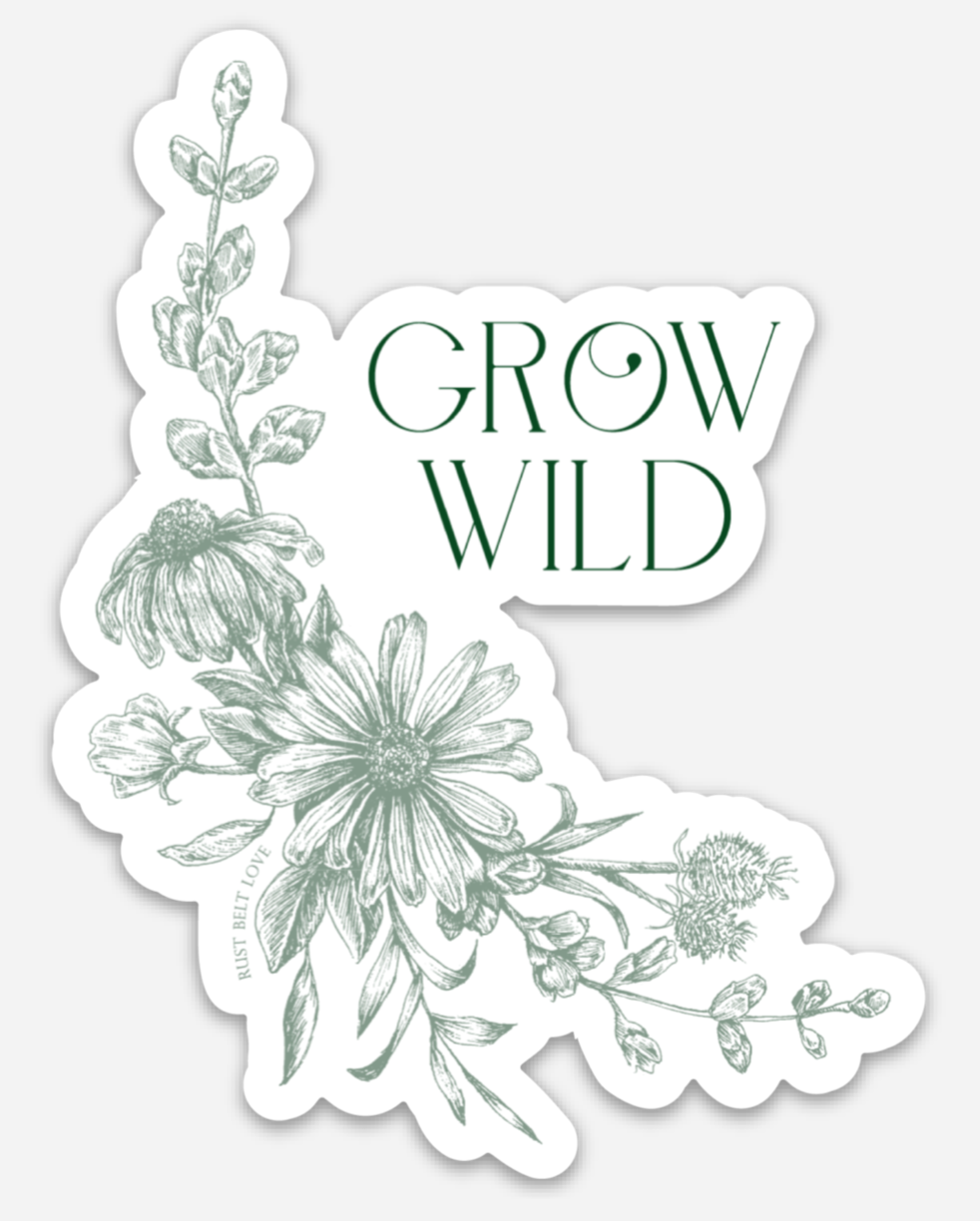 Green floral sticker that says "Grow wild" by Rust Belt Love