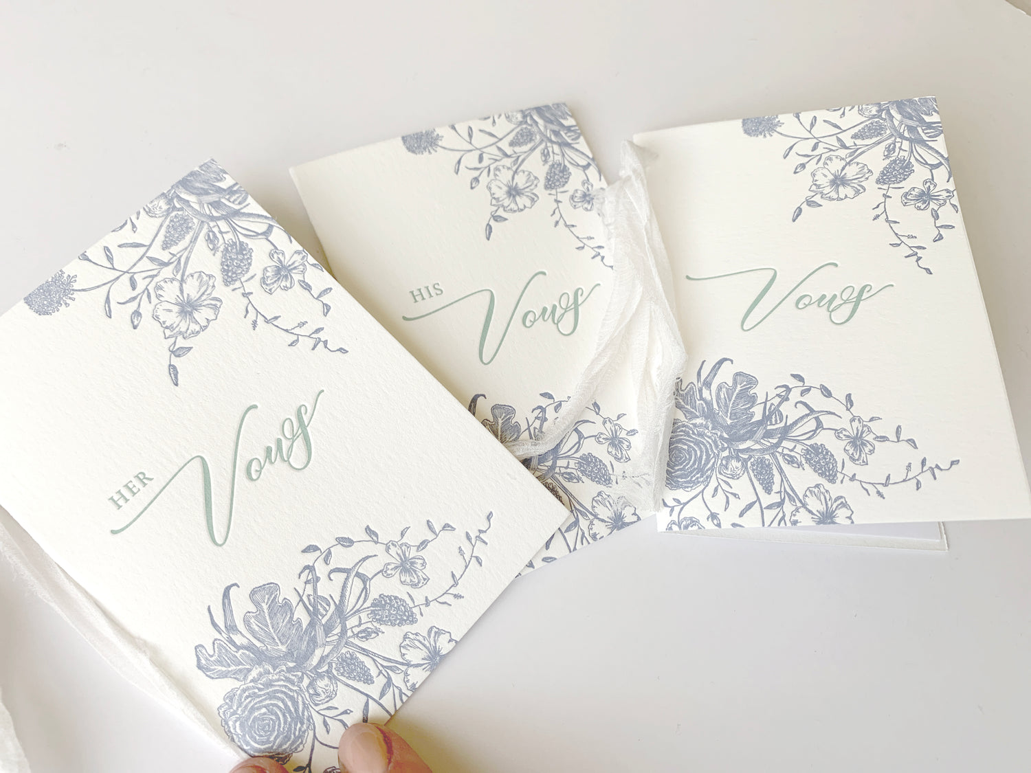 Letterpress vow books with florals that say " Her Vows" or "His Vows" by Rust Belt Love
