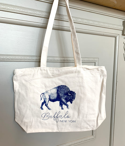 Canvas tote with a blue illustration of a buffalo that says "Buffalo New York" by Rust Belt Love
