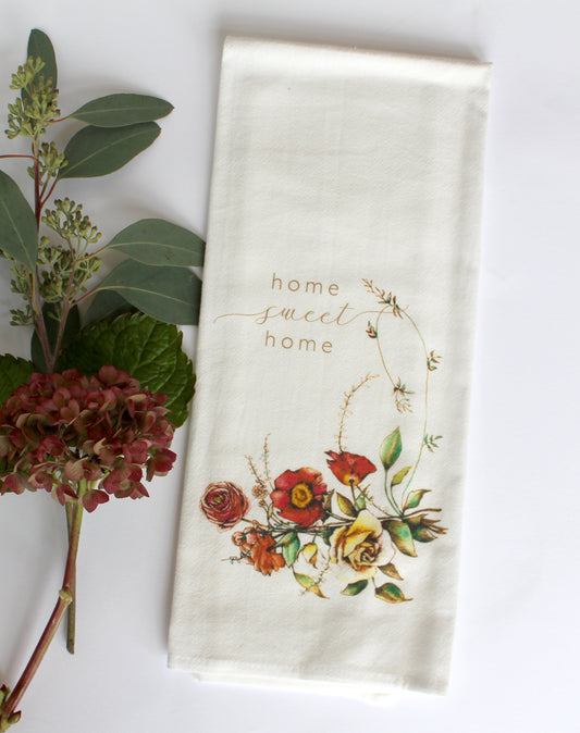 White Tea Towel with florals that says "home sweet home" by Rust Belt Love